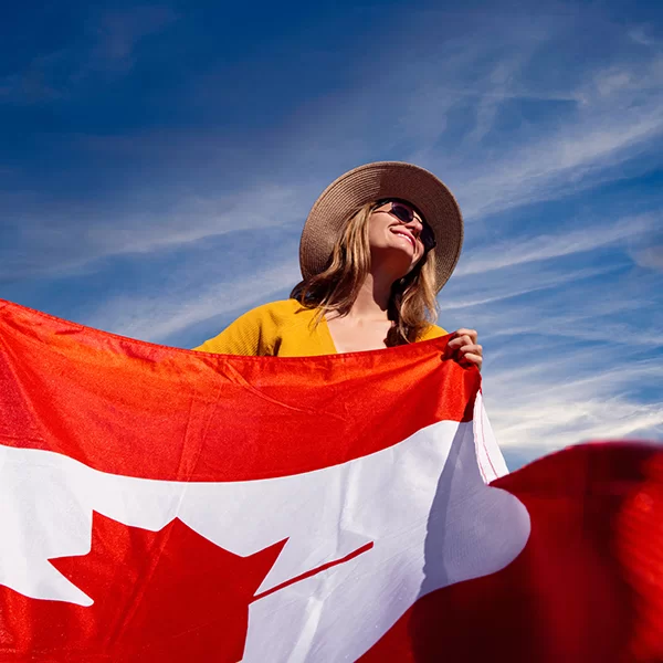 Woman holding a Canadian flag
